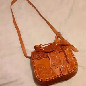Cute leather horse sattle handbag